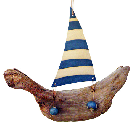 Ceramic and driftwood sailing boat, an ideal nautical gift