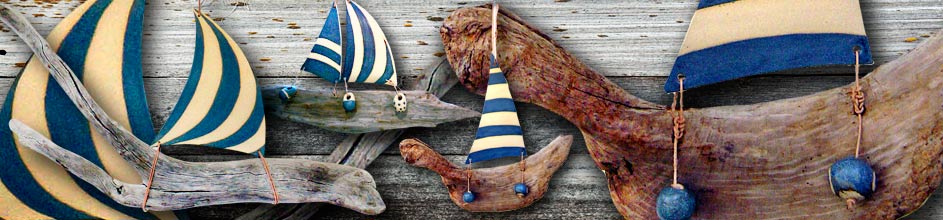 Jan Guest coastal art - Ceramic and driftwood boats